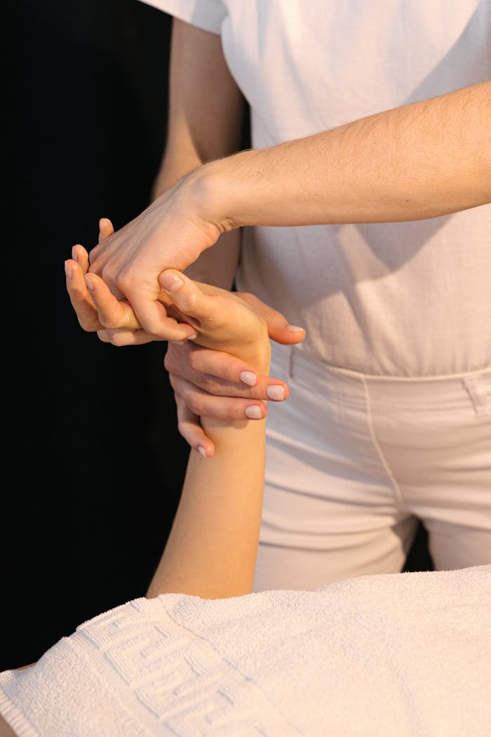 A close-up of a calming hand massage therapy session for relaxation and stress relief.